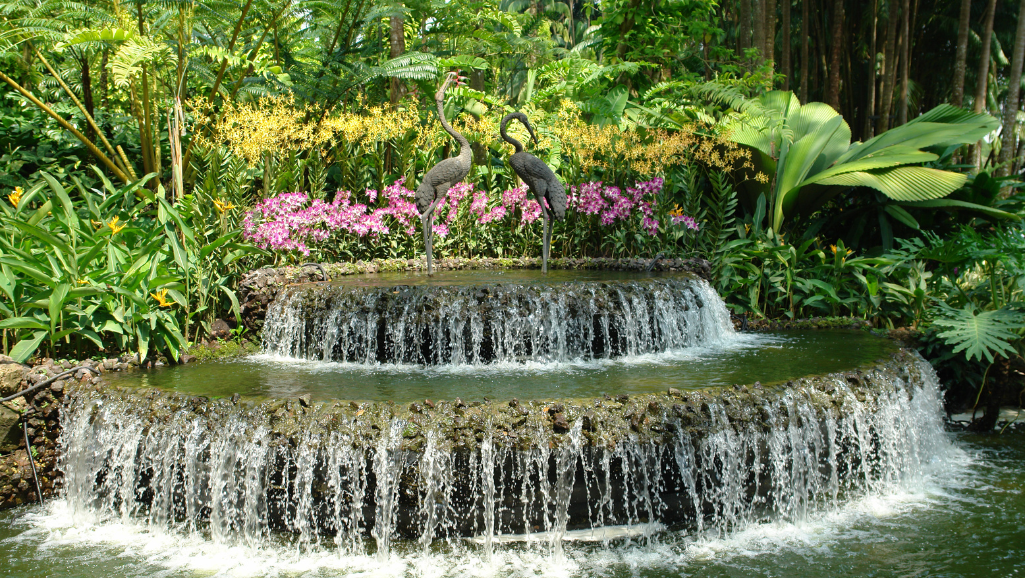 A serene garden oasis, lush with flourishing plants and soothing water features. In the foreground, a person meditating in a peaceful lotus position, eyes closed, exuding a sense of calm. Sunlight filters through the canopy, casting a warm glow across the scene. The middle ground features a cozy reading nook with an inviting armchair and a stack of self-help books. In the background, a tranquil yoga studio with practitioners flowing through gentle poses, surrounded by natural elements like driftwood and river stones. The overall atmosphere is one of mindfulness, restoration, and a harmonious integration of lifestyle adjustments to support mental well-being.